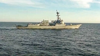 In this handout photo taken from video released by Russian Defense Ministry Press Service, the U.S. destroyer USS Chafee is seen from Russian navy's Admiral Tributs destroyer near Russian territorial waters in the Sea of Japan on Friday, Oct. 15, 2021. (AP) In this handout photo taken from video released by Russian Defense Ministry Press Service, the U.S. destroyer USS Chafee is seen from Russian navy's Admiral Tributs destroyer near Russian territorial waters in the Sea of Japan on Friday, Oct. 15, 2021. (AP)