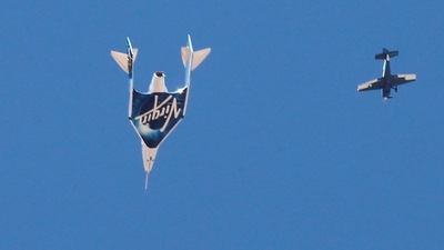 Virgin Galactic's passenger rocket plane VSS Unity, carrying billionaire entrepreneur Richard Branson and his crew, descends after reaching the edge of space above Spaceport America near Truth or Consequences, New Mexico, US (REUTERS File)