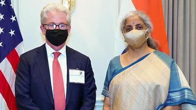 India’s finance minister Nirmala Sitharaman with Curtis L. Buser, Chief Financial Officer, Carlyle Group, in Washington DC on Thursday. India and the US pledged to raise funds to tackle climate change at a meeting led by Sitharaman and Janet Yellen. (ANI) India’s finance minister Nirmala Sitharaman with Curtis L. Buser, Chief Financial Officer, Carlyle Group, in Washington DC on Thursday. India and the US pledged to raise funds to tackle climate change at a meeting led by Sitharaman and Janet Yellen. (ANI)