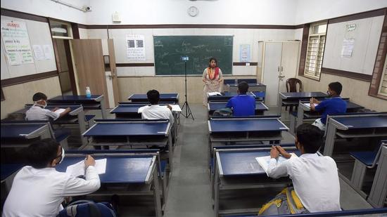Currently, only students from classes 9 to 12 are allowed to attend physical classes. (Hindustan Times)