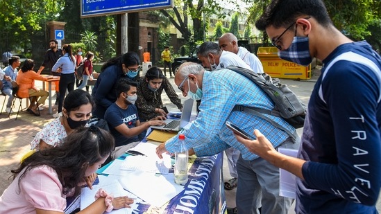 Students at a help desk at the Delhi University (DU) north campus. (Amal KS/HT Photo) Students at a help desk at the Delhi University (DU) north campus. (Amal KS/HT Photo)