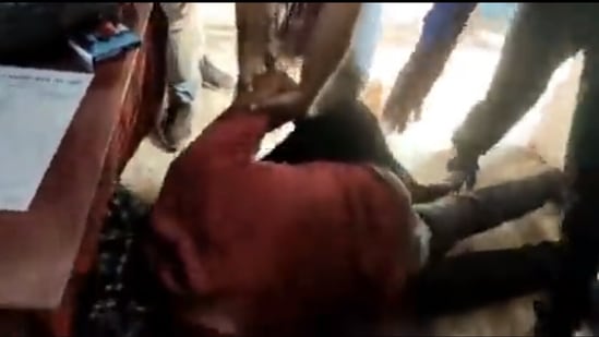 Two men seen fighting over who's better for the principal's post in Bihar. (Screengrab from video)