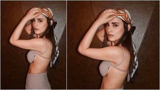 Earlier, Radhika Madan made heads turn when she posed in a beige bralette and wrap around.(Instagram/@radhikamadan)