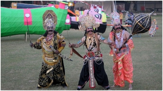 Actors, dressed as Ravana, Kumbhkarana nd Meghnath, pose for the cameras.(HT Photos/ Ravi Kumar)