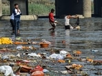Devotees throw 'puja' offerings in the River Yamuna on the last day of the 'Navratri' festival in New Delhi. (PTI) Devotees throw 'puja' offerings in the River Yamuna on the last day of the 'Navratri' festival in New Delhi. (PTI)