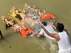 Vijayadashami marks the final day of the Durga Puja festival. On this day devotees bid goodbye to Goddess Durga by immersing the idols in water. In the North, devotees burn effigies of Ravan, Meghnad and Kumbhakaran. Here's how the people of Kolkata celebrated Vijayadashami.(PTI)