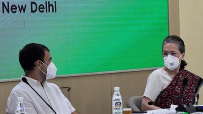 Congress interim president Sonia Gandhi with party leader Rahul Gandhi during the Congress Working Committee (CWC) meeting on Saturday. (PTI) Congress interim president Sonia Gandhi with party leader Rahul Gandhi during the Congress Working Committee (CWC) meeting on Saturday. (PTI)