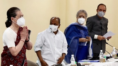 Congress Interim President Sonia Gandhi greets during the party working committee meeting at AICC office in New Delhi. Senior Congress leaders AK Antony, Ambika Soni and Ghulam Nabi Azad were also present. (ANI) Congress Interim President Sonia Gandhi greets during the party working committee meeting at AICC office in New Delhi. Senior Congress leaders AK Antony, Ambika Soni and Ghulam Nabi Azad were also present. (ANI)