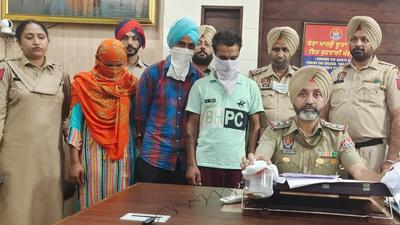 The accused in the custody of Mohali police on Saturday. Navneet’s accomplices had entered the shop posing as customers, while she waited in a car outside. (HT Photo)
