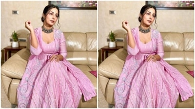 Hina teamed the dress with a pink wrap jacket embroidered in silver. (Instagram/@realhinakhan) Hina teamed the dress with a pink wrap jacket embroidered in silver. (Instagram/@realhinakhan)