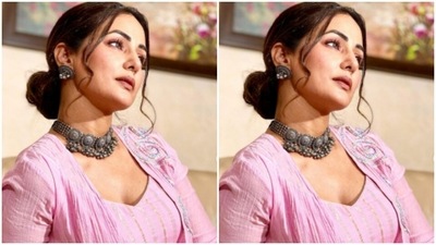 Hina accessorised her look for the fashion photoshoot with classic silver jewellery. She opted for a silver choker and silver earrings to complement her attire. (Instagram/@realhinakhan) Hina accessorised her look for the fashion photoshoot with classic silver jewellery. She opted for a silver choker and silver earrings to complement her attire. (Instagram/@realhinakhan)
