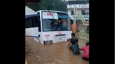 The video of a KSRTC bus being pulled by local residents after it got stuck in water in Poonjar is going viral on social media