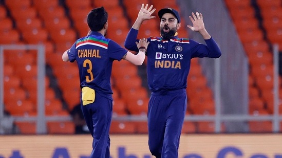 Virat Kohli and Yuzvendra Chahal in action during the England series at home.(BCCI)