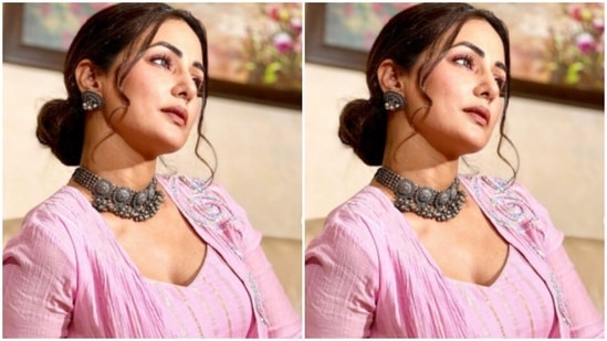 Hina accessorised her look for the fashion photoshoot with classic silver jewellery. She opted for a silver choker and silver earrings to complement her attire.(Instagram/@realhinakhan)
