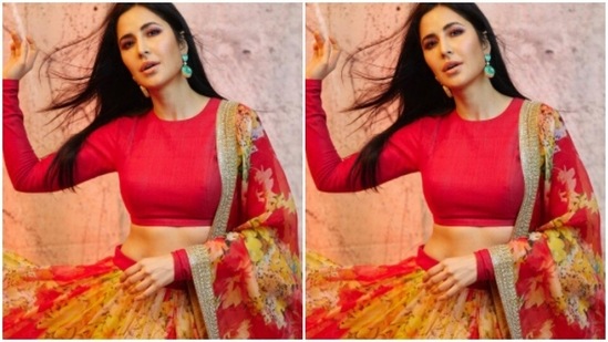 The actor posed for the photoshoot. She teamed a long-sleeved red blouse with a floral printed silk flowy skirt.(Instagram/@katrinakaif)