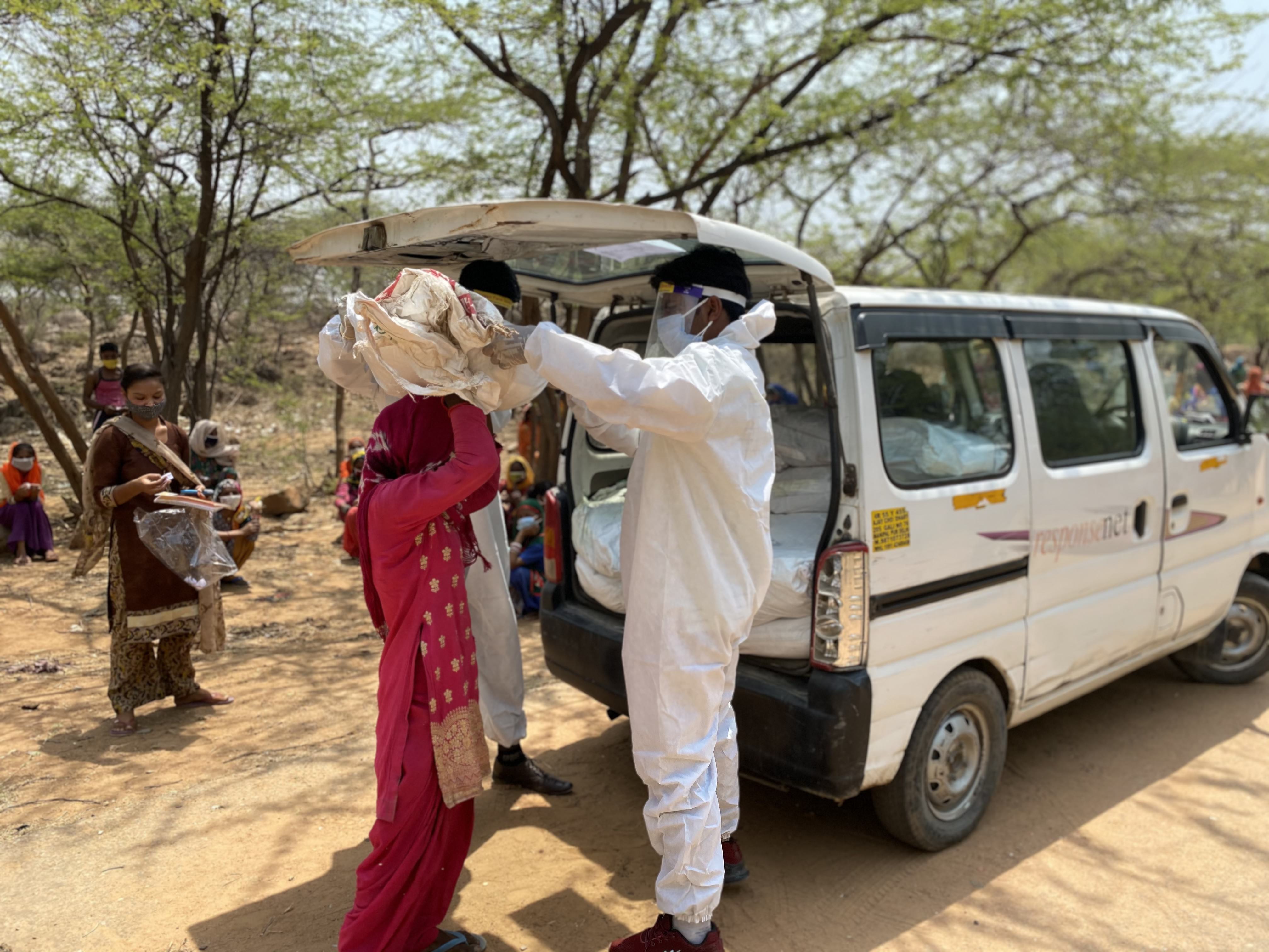 Kuldip Nar from ResponseNet provides monthly ration to the underprivileged families. Kuldip Nar from ResponseNet provides monthly ration to the underprivileged families.
