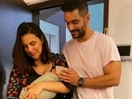 Neha Dhupia and Angad Bedi with their newborn son. Neha Dhupia and Angad Bedi with their newborn son.
