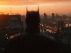 A still of Robert Pattinson in The Batman. A still of Robert Pattinson in The Batman.
