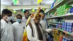 Khattar inaugurated the first Har Hith grocery store in Farrukhnagar and also became the first customer to buy goods from such a store. (Parveen Kumar/HT Photo) Khattar inaugurated the first Har Hith grocery store in Farrukhnagar and also became the first customer to buy goods from such a store. (Parveen Kumar/HT Photo)