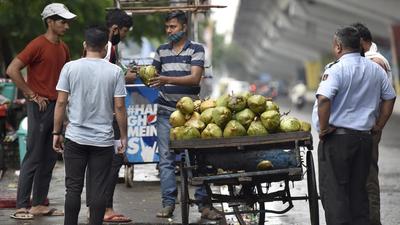 According to sellers, a piece of tender coconut that was being sold at ₹50-55 till third week of September is now available for ₹65-70 in the district. (Sunil Ghosh/HT) According to sellers, a piece of tender coconut that was being sold at ₹50-55 till third week of September is now available for ₹65-70 in the district. (Sunil Ghosh/HT)