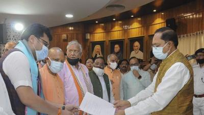 Nitin Agarwal files his nomination for the post of deputy speaker of the Uttar Pradesh assembly in the presence of chief minister Yogi Adityanath at Vidhan Bhavan in Lucknow on Sunday, (PTI Photo) Nitin Agarwal files his nomination for the post of deputy speaker of the Uttar Pradesh assembly in the presence of chief minister Yogi Adityanath at Vidhan Bhavan in Lucknow on Sunday, (PTI Photo)