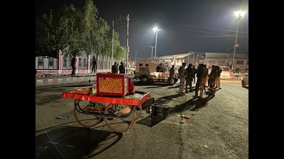Soldiers cordon off an area where a street vendor was shot, in Srinagar on Saturday. (AP) Soldiers cordon off an area where a street vendor was shot, in Srinagar on Saturday. (AP)