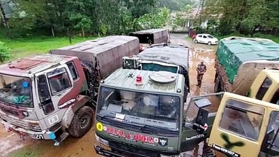 Army vehicles arrive for the search and rescue operation at a landslide affected area due to incessant rainfall, at Koottickal, in Kottayam on October 17. (ANI) Army vehicles arrive for the search and rescue operation at a landslide affected area due to incessant rainfall, at Koottickal, in Kottayam on October 17. (ANI)