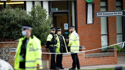 Police officers guard the scene where British MP David Amess was stabbed to death during a meeting with constituents at the Belfairs Methodist Church, in Leigh-on-Sea, Britain, October 16, 2021.&nbsp; (REUTERS)
