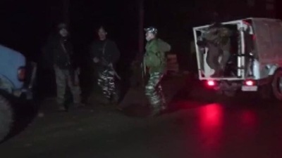 Security officials at the spot in Kulgam where Sunday's terrorist attack took place.&nbsp; (ANI)