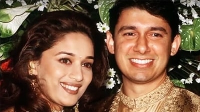 This picture from Madhuri Dixit and Dr Shriram Nene's wedding reception has several memories linked to it. She had once revealed that he could recognise only Amitabh Bachchan among the many celebrity guests at the function. This picture from Madhuri Dixit and Dr Shriram Nene's wedding reception has several memories linked to it. She had once revealed that he could recognise only Amitabh Bachchan among the many celebrity guests at the function.