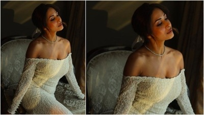 For accessories, Malaika Arora opted for a simple diamond necklace and a ribbon hair tie. (Instagram/@malaikaaroraofficial) For accessories, Malaika Arora opted for a simple diamond necklace and a ribbon hair tie. (Instagram/@malaikaaroraofficial)