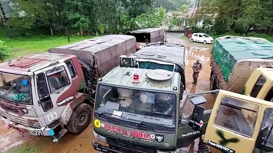 Army vehicles arrive for the search and rescue operation at a landslide affected area due to incessant rainfall, at Koottickal, in Kottayam on October 17.(ANI)