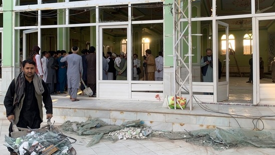 People view the damage inside of a mosque following a suicide bombers attack in the city of Kandahar, southwest Afghanistan(AP)