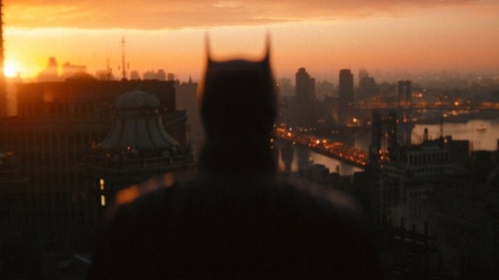 A view of Gotham city at sunset from Batman's perspective.