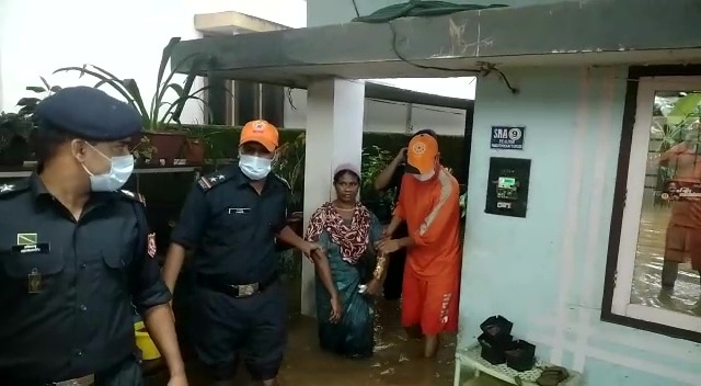 Local residents at Muvattupuzha in Ernakulam district being rescued by National Disaster Response Force (NDRF) personnel on October 17, 2021. (ANI Photo)