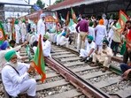 Members of various farmers organizations block railway tracks during the 'rail roko' protest against the central government in Patiala.(PTI)