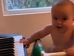 Baby's reaction to music being played on piano will tempt you to watch it again. (Instagram/@abbylawparker) Baby's reaction to music being played on piano will tempt you to watch it again. (Instagram/@abbylawparker)