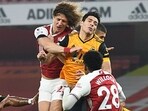 David Luiz of Arsenal clashes heads with Raul Jimenez of Wolves in November of 2020. (Getty)