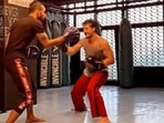 Tiger Shroff had a boxing fight with his trainer. Guess who won?(Instagram/@tigerjackieshroff) Tiger Shroff had a boxing fight with his trainer. Guess who won?(Instagram/@tigerjackieshroff)