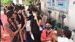 A health worker administers a dose of Covid-19 vaccine to a beneficiary at SKM Hall in Patna. (PTI) A health worker administers a dose of Covid-19 vaccine to a beneficiary at SKM Hall in Patna. (PTI)