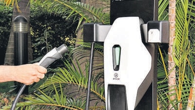 The Inox multiplex theatre at Bund garden is laying claim to being the first cinema in India to be equipped with charging stations for electric two-wheelers and four-wheelers. (Ravindra Joshi/HT PHOTO) The Inox multiplex theatre at Bund garden is laying claim to being the first cinema in India to be equipped with charging stations for electric two-wheelers and four-wheelers. (Ravindra Joshi/HT PHOTO)