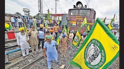 Farmers blocking the tracks during rail roko against the Lakhimpur Kheri incident, in Ludhiana on Monday. (Gurpreet Singh/HT) Farmers blocking the tracks during rail roko against the Lakhimpur Kheri incident, in Ludhiana on Monday. (Gurpreet Singh/HT)