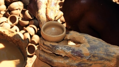 Choti Diwali which is also known as Naraka Chaturdashi is observed on the second day. Potters all over the country are putting in all their efforts in making diyas ahead of the festival. (ANI) Choti Diwali which is also known as Naraka Chaturdashi is observed on the second day. Potters all over the country are putting in all their efforts in making diyas ahead of the festival. (ANI)