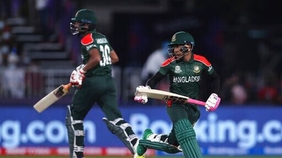 Bangladesh's batsman Mushfiqur Rahim, right, and captain Mohammad Mahmudullah run between the wickets during the Cricket Twenty20 World Cup first round match between Bangladesh and Scotland in Muscat, Oman, Sunday, Oct. 17, 2021. (AP Photo/Kamran Jebreili) (AP) Bangladesh's batsman Mushfiqur Rahim, right, and captain Mohammad Mahmudullah run between the wickets during the Cricket Twenty20 World Cup first round match between Bangladesh and Scotland in Muscat, Oman, Sunday, Oct. 17, 2021. (AP Photo/Kamran Jebreili) (AP)
