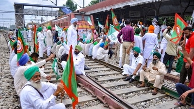 Members of various farmers organizations block railway tracks during the 'rail roko' protest against the central government in Patiala. (PTI) Members of various farmers organizations block railway tracks during the 'rail roko' protest against the central government in Patiala. (PTI)