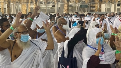 Muslim pilgrims circumambulate around the Kaaba, the cubic building at the Grand Mosque, without social distancing for the first time since the beginning of coronavirus pandemic.&nbsp; (AP)