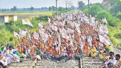 Farmers block railway tracks as part of the Samyukt Kisan Morcha ‘Rail Roko’ protest at Devi Dass Pura in Amritsar on Monday. (Sameer Sehgal/HT photo) Farmers block railway tracks as part of the Samyukt Kisan Morcha ‘Rail Roko’ protest at Devi Dass Pura in Amritsar on Monday. (Sameer Sehgal/HT photo)