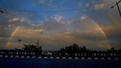 A rainbow appears in Delhi on Monday, as the air got remarkably cleaner due to the rain. (PTI) A rainbow appears in Delhi on Monday, as the air got remarkably cleaner due to the rain. (PTI)