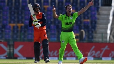 Ireland's Curtis Campher celebrates after taking the wicket of Netherland's Scott Edwards. (Getty) Ireland's Curtis Campher celebrates after taking the wicket of Netherland's Scott Edwards. (Getty)