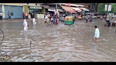 A waterlogged market in Agra after heavy rainfall on Monday. (HT) A waterlogged market in Agra after heavy rainfall on Monday. (HT)